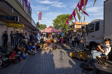 2024 Cabramatta Moon Festival Jason Tran busking on John Street.