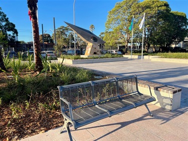 Public bench in front of Fairfield International Monument