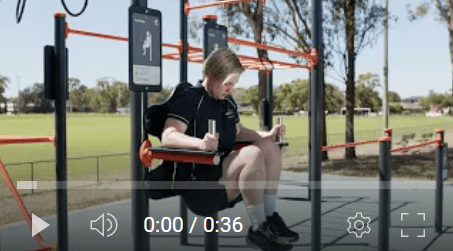 womens using the leg raise machine at fairfield city outdoor gyms in parks