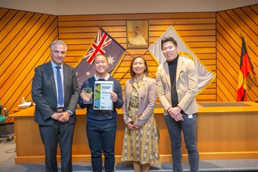 Award winner Jonathan Ou posing next to Mayor Frank Carbone and Councillors Dai Le and Kevin Lam