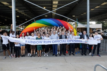 Fairfield Youth Advisory Committee and Council Members holding Official Opening Sign at Rainbow Run Entrance