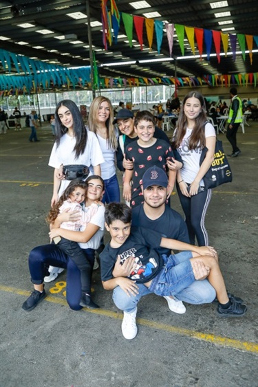 Family smiling and posing at Bring It On! Festival