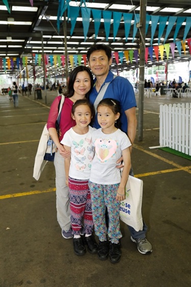 Family smiling and posing at Bring It On! Festival