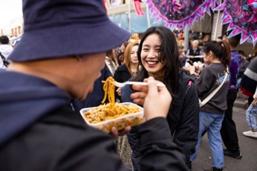 People eating noodles
