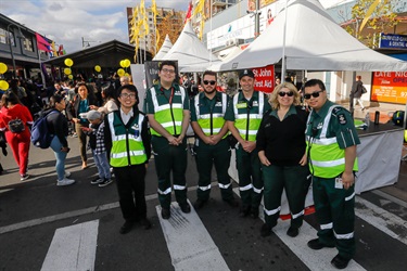 Group of Saint John's Ambulance staff smiling and posing