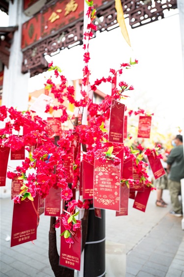 Cherry blossom prop tree with red envelope decorations