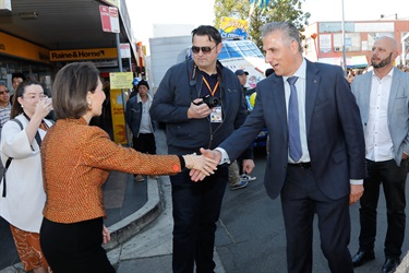 New South Wales Premier Gladys Berejiklian shaking hands with Fairfield City Mayor Frank Carbone