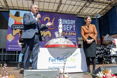 Deputy Mayor Paul Adam Azzo, Councillor Dai Le, Councillor Ninos Khoshab, Premier Gladys Berejiklian, Mayor Frank Carbone, Councillor Adrian Wong, Councillor Sera Yilmaz and Councillor Peter Grippaudo posing with moon themed cake