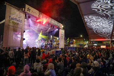 Crowd of guests watching performance on stage