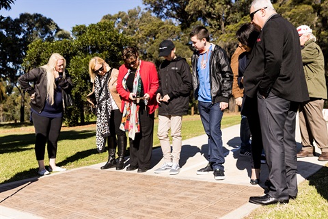 Fairfield City residents looking at the personalised pavers at Fairfield City showground