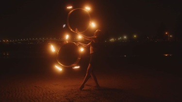 woman dancing with fire