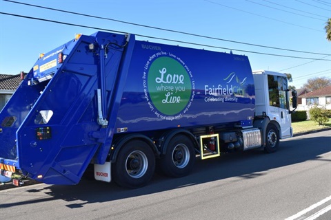 Blue garbage truck