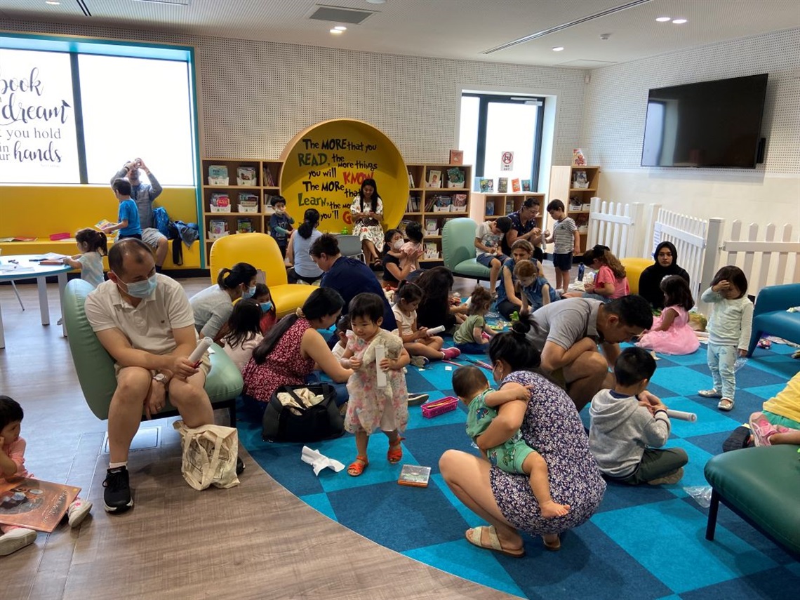 young children playing in the reading room