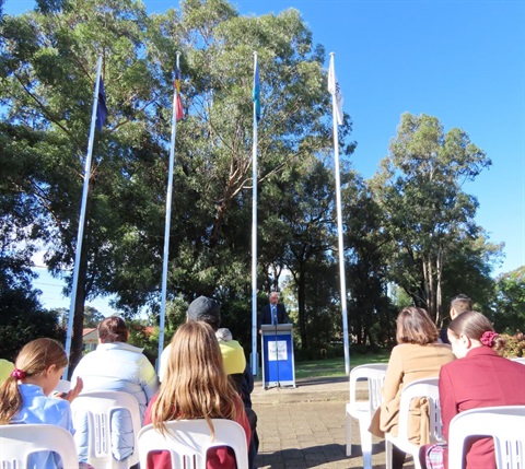 reconciliation day Mayor Frank Carbone delivering a speech