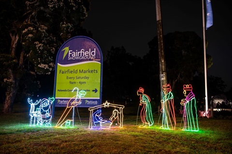 Christmas Lights in front of the Fairfield Markets sign