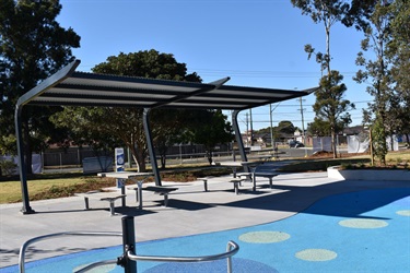 Under cover benches and tables at Bareena Park