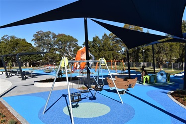 Swings and other play equipment at Bareena Park