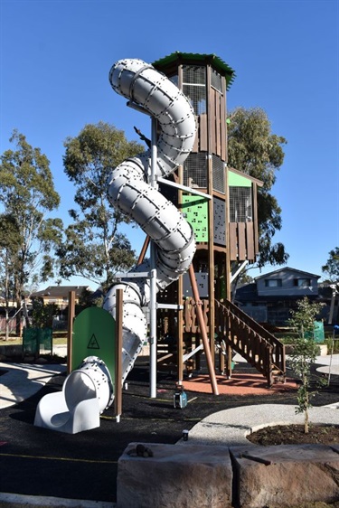 Three story climbing fortress with spiral tube slide