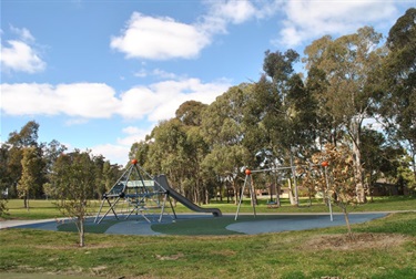 Climbing nets, playground slides and swings