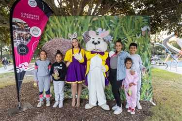 Family taking a photo with the Easter Bunny at Bareena Park.