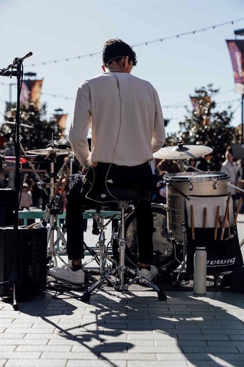 Alex Milan playing drums