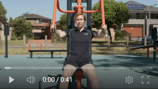 women using the chest press machine at fairfield city outdoor gyms in parks