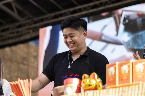 Dim Sim Lim cooking on stage at Cabramatta Moon Festival 2024