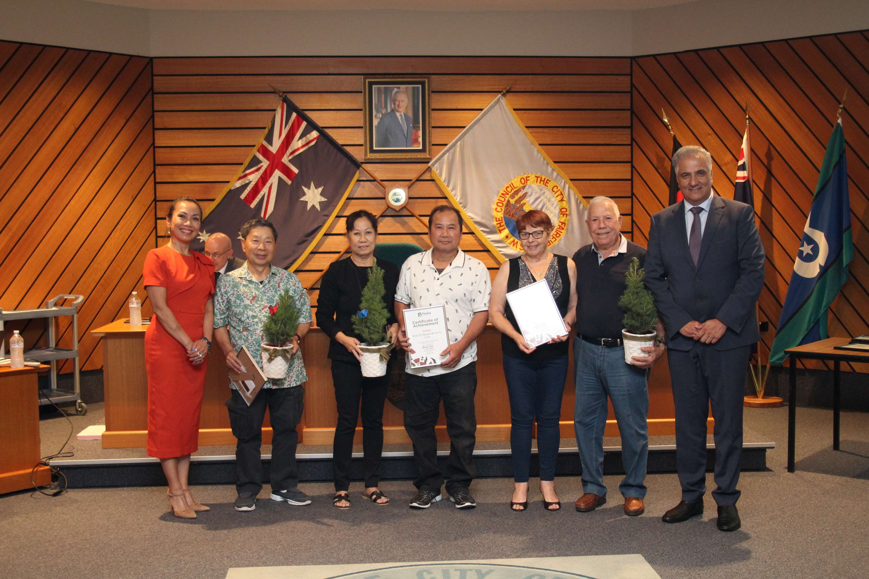 Group photo of the 2024 Residential Garden of the Year winners and finalists with Mayor Frank Carbone and Deputy Mayor Dai Le