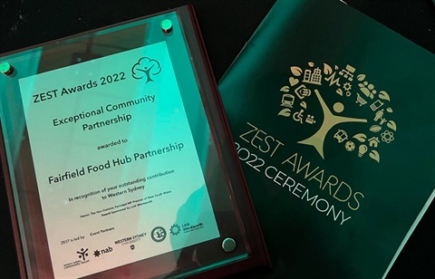 2022 ZEST Award plaque next to ZEST Awards ceremony booklet