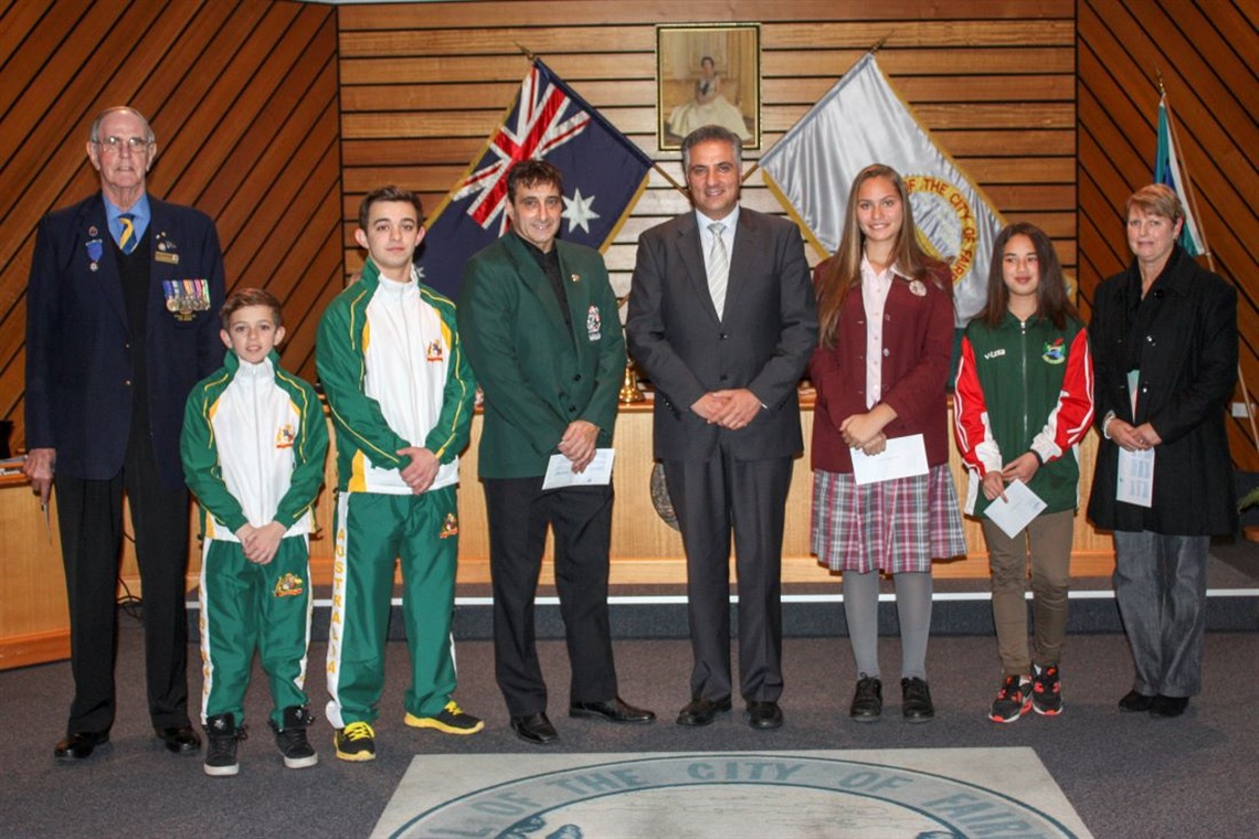 Mayor Frank Carbone with students at Council Chambers