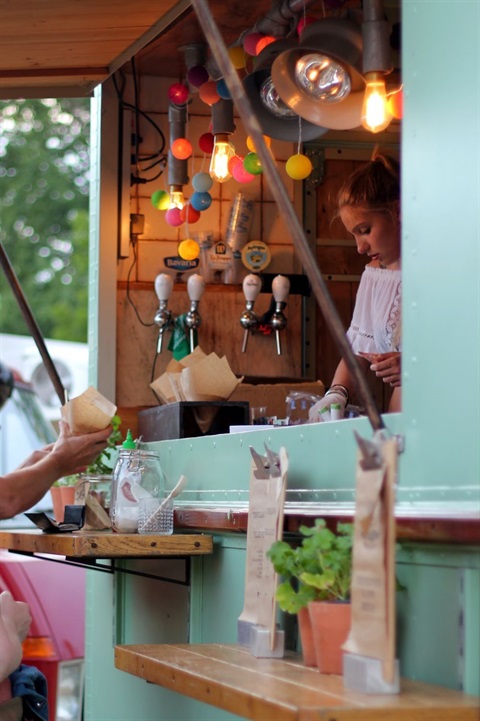 food truck worker handing out food