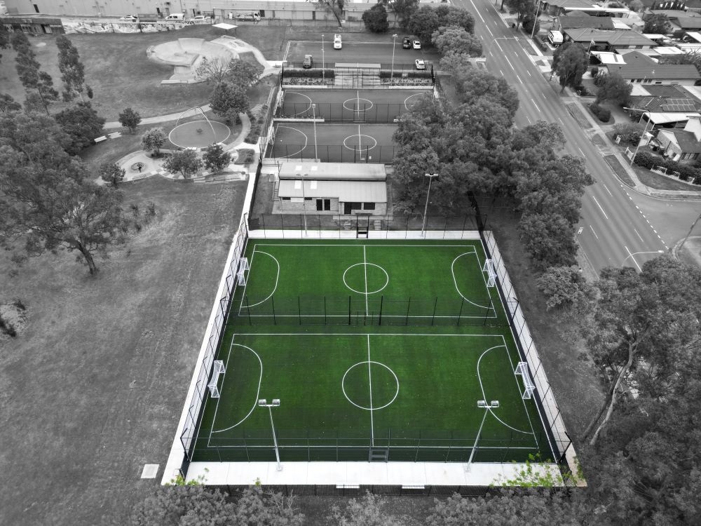 Aerial view of Emerson courts 3 & 4 highlighted on grey background.