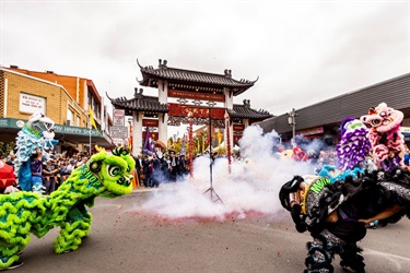Lion dancing with firecrackers