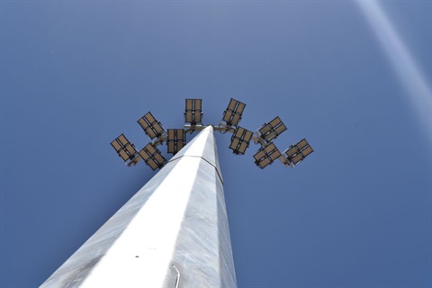 Photo of sportsfield lights taken from the ground