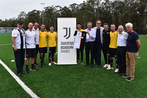 Mayor Frank Carbone smiling and posing with Juventus Academy Sydney members