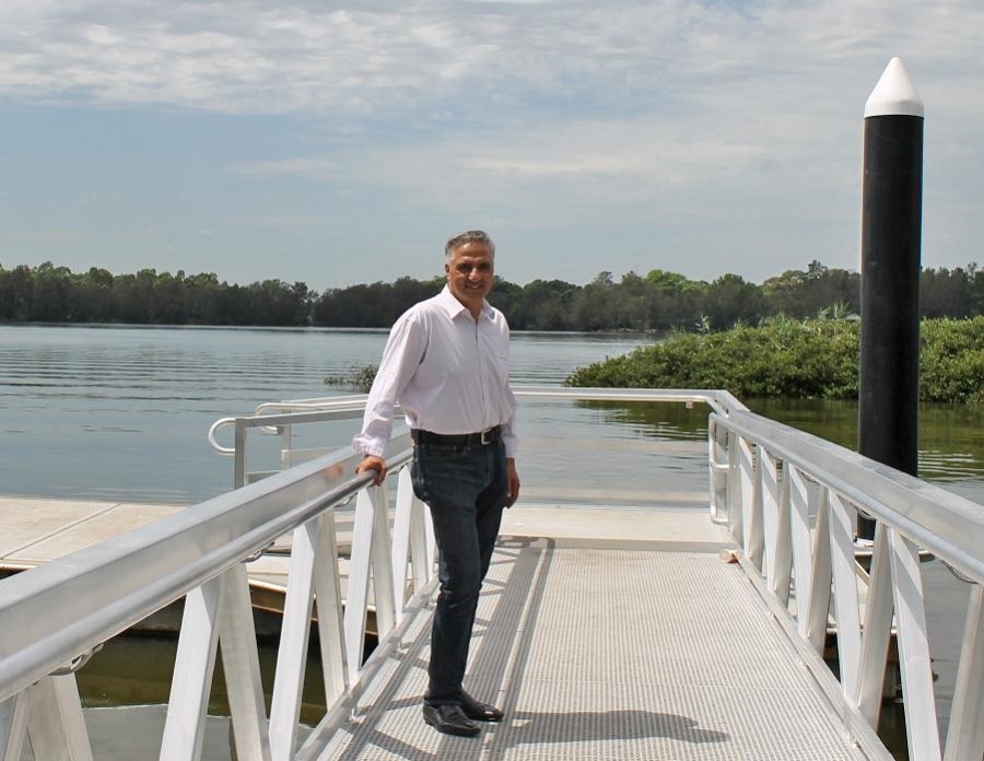 Mayor Frank Carbone smiling and posing at Bradbury Wharf
