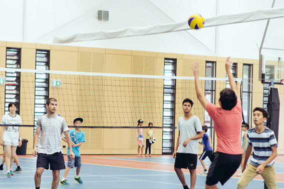 Group of young people playing volley ball at the Fairfield Youth and Community Centre 