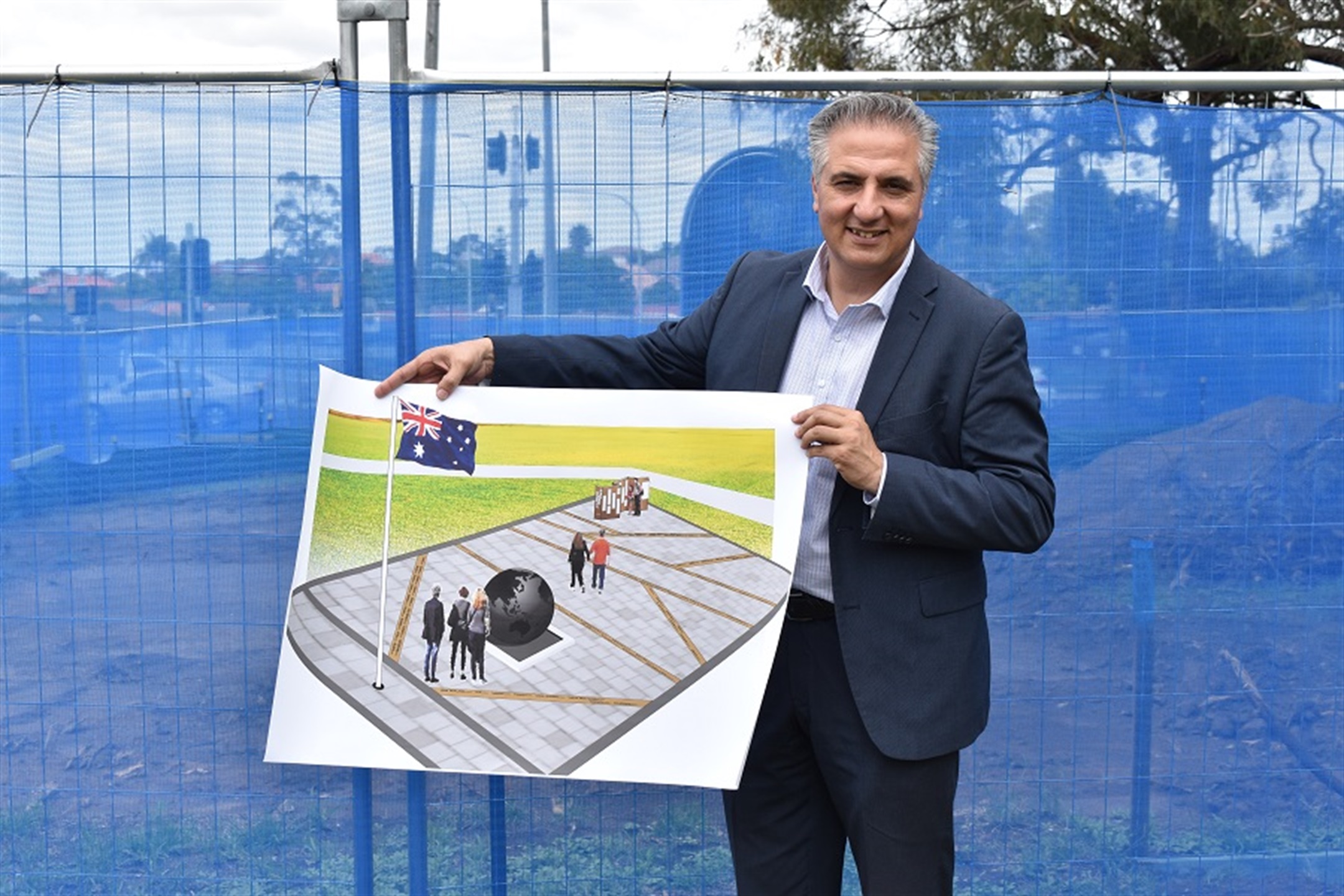 Mayor Frank Carbone with an artist impression of the new landmark.