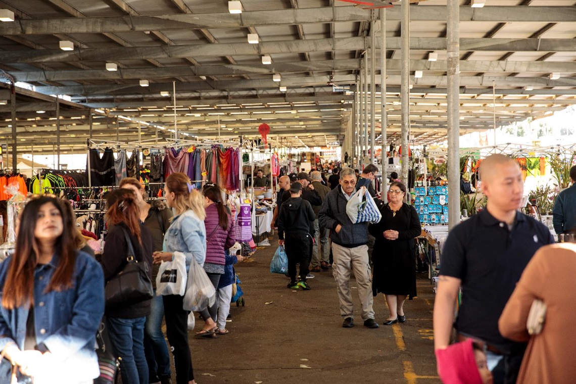 Crowd of guests looking at different stalls at Fairfield Markets
