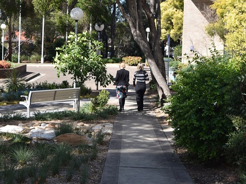 People walking on pathway outside Fairfield City Council Administration Centre