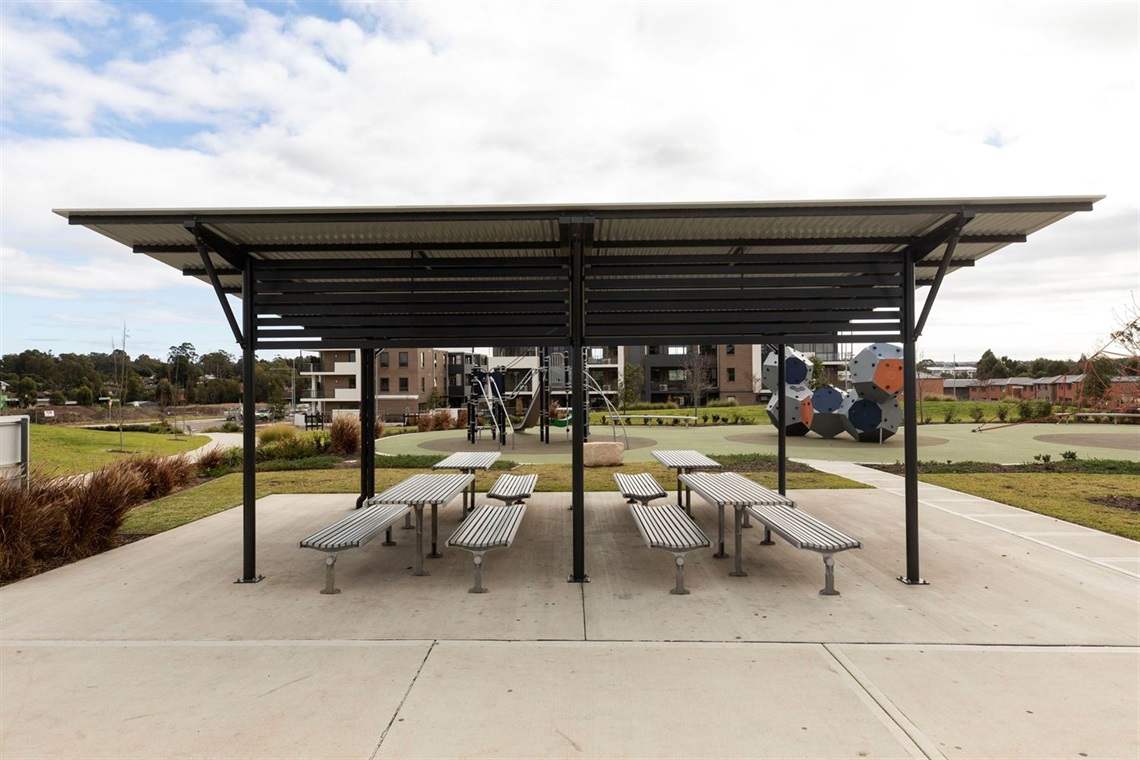 Shaded areas with tables and benches at Bunker Park.