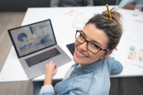 Young lady using her laptop computer visiting Council website