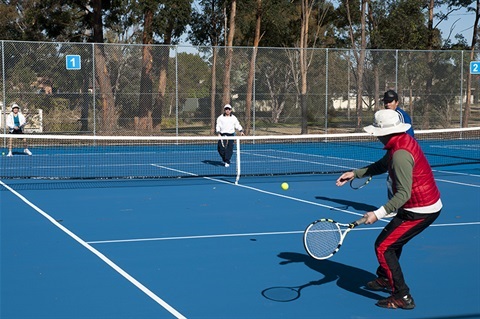 4 people playing tennis at Avenel park