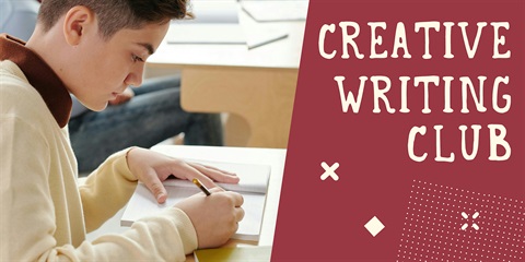 A kid writing in a notebook.