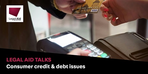 Hands handing credit card.