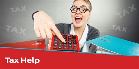 A person with a blurred face points at a red calculator while holding a red binder. A blue binder lies on the table. The background features the word 'TAX' repeated in light gray. A red banner at the bottom displays the white text 'Tax Help'.